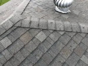 asphalt shingle roof with hail damage