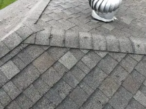 What To Do If Hail Has Damaged Your Roof 1 Hail damage on an asphalt shingle roof