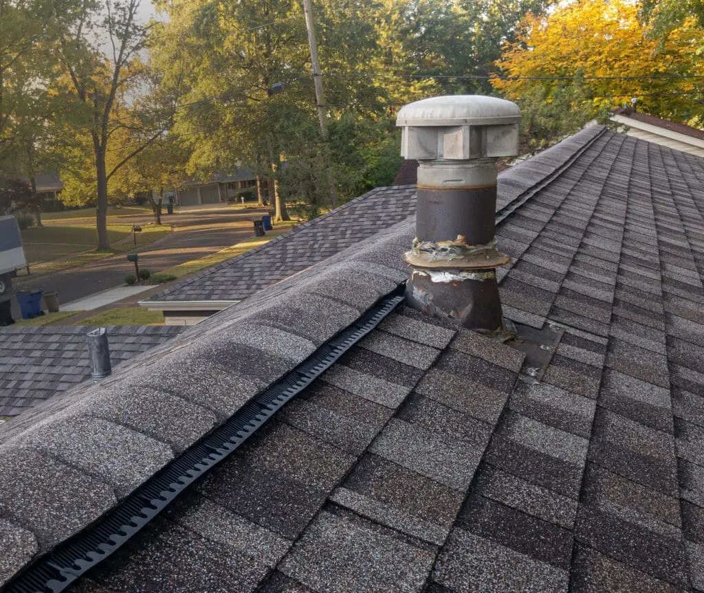 ridge vent on top of an asphalt shingle roof