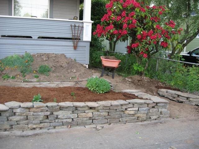 Unfinished garden outside a suburban home