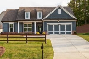 Gutter Installation Middleton WI A gray ranch style model house in a new neighborhood.
