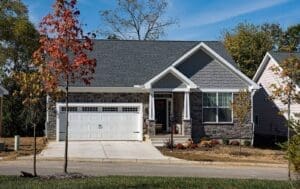 Roof Replacement Fitchburg WI Newly Built Upscale Stone Home in Fall