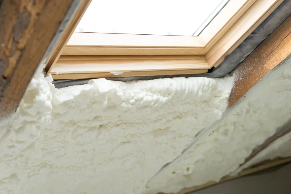 spray foam insulation by a window
