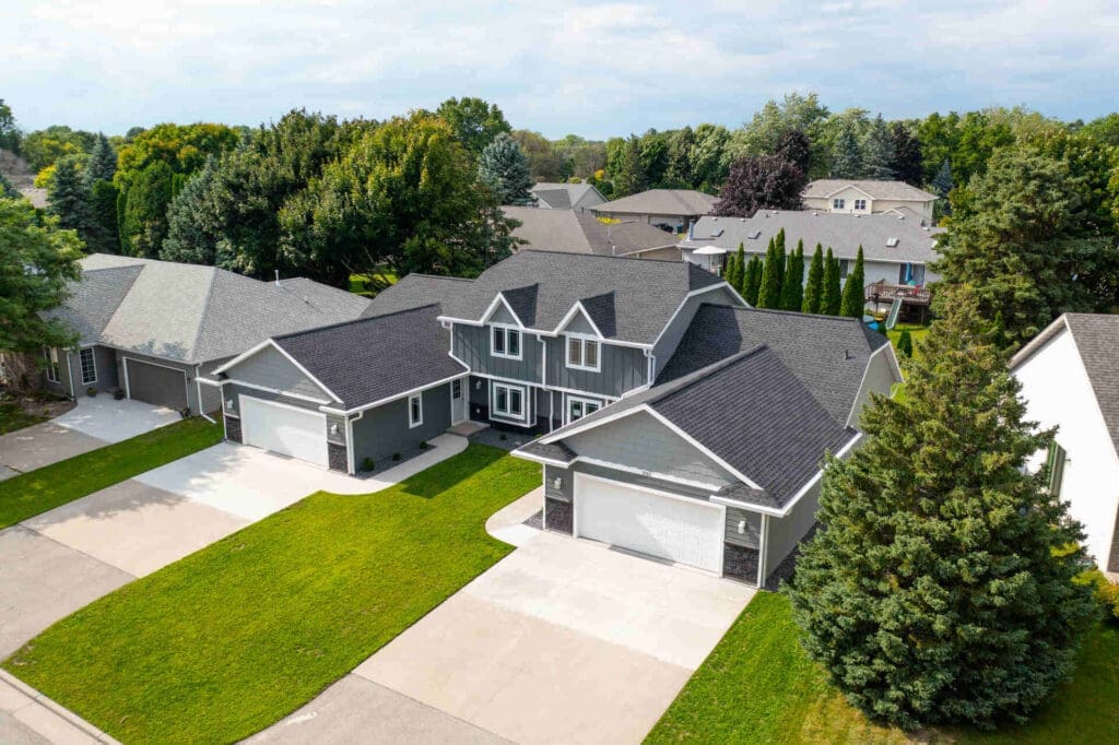 gray house with asphalt shingle roof