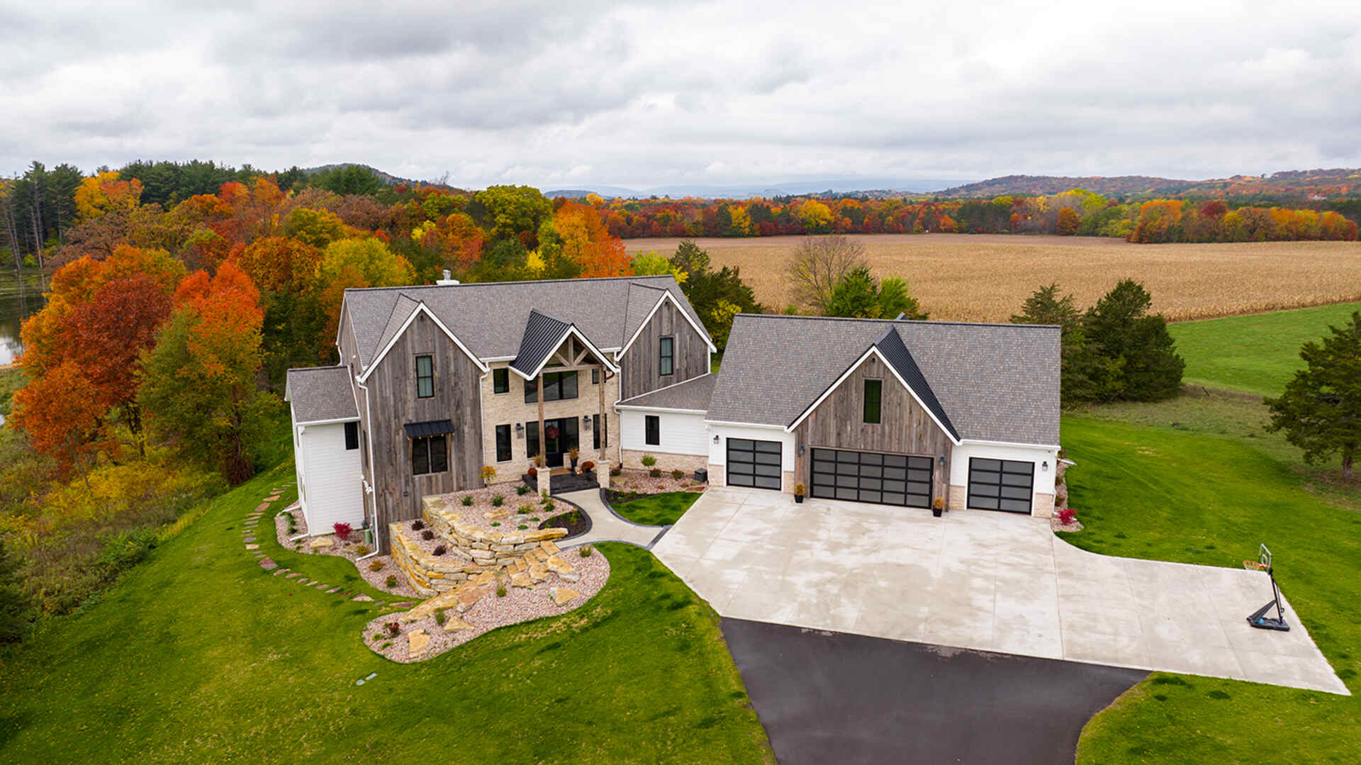 home in the woods with a new roof
